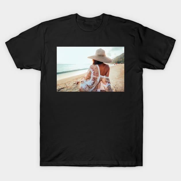 Beautiful Elegant Woman Sitting on Beach and Watching the Ocean T-Shirt by visualspectrum